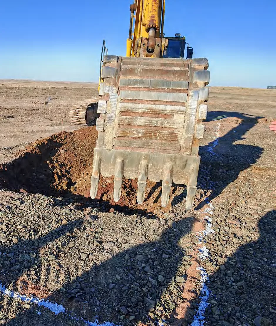 Excavator working at a mine site
